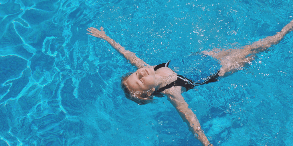 A child doing a starfloat